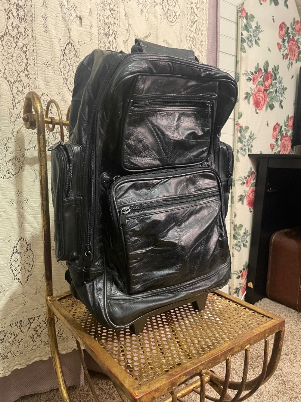 Vintage patchwork leather rolling backpack
